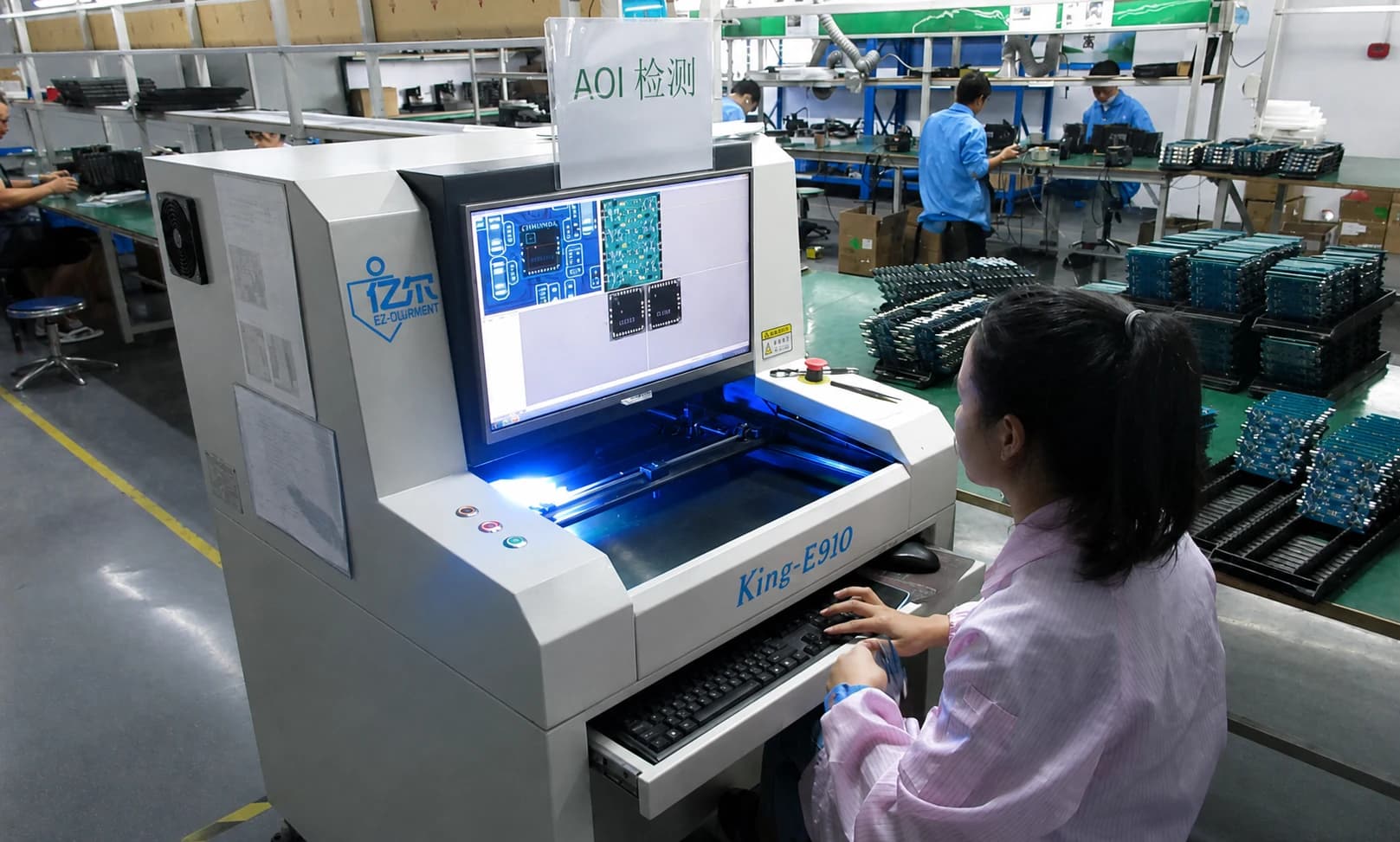 AOI inspection station checking PCB solder points during production